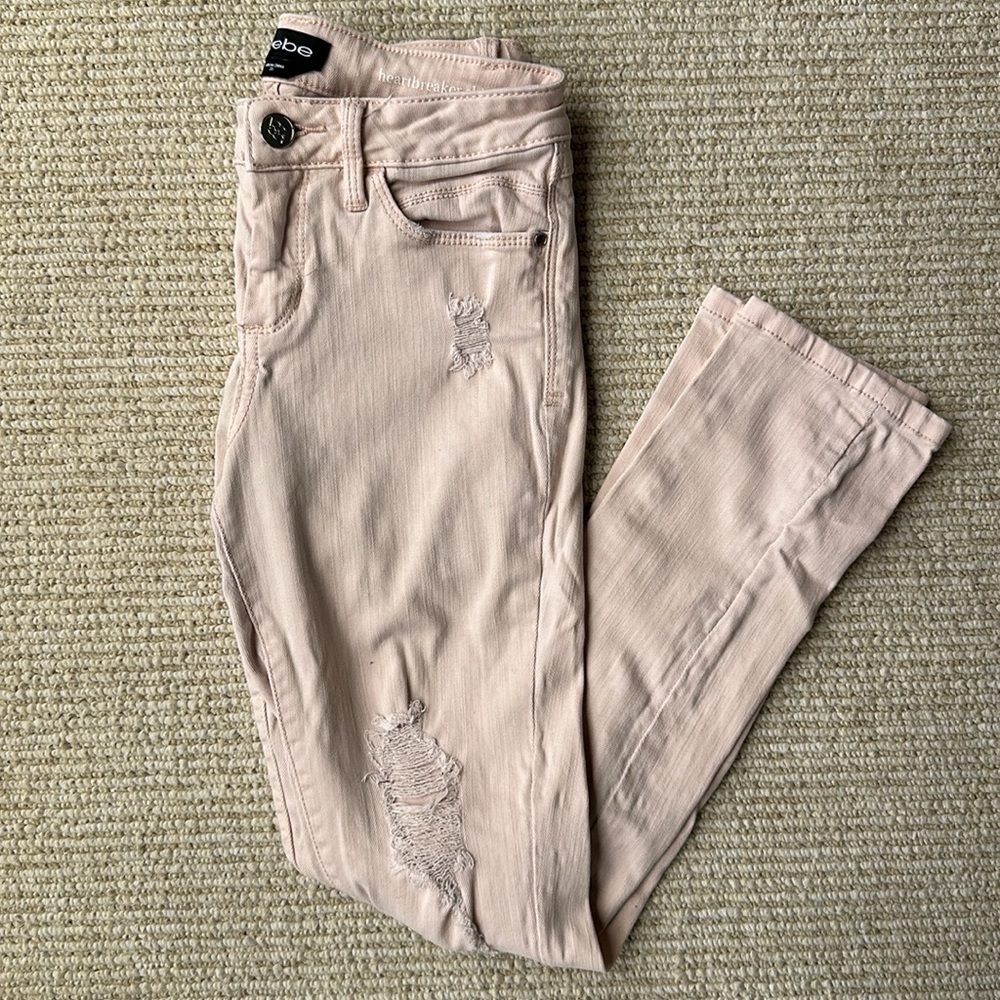 BEBE ripped skinny jeans. - Picture 1 of 4